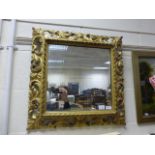 A 19th century carved wooden gilt mirror