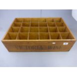 A vintage pine Victoria Wine 24 bottle carrier