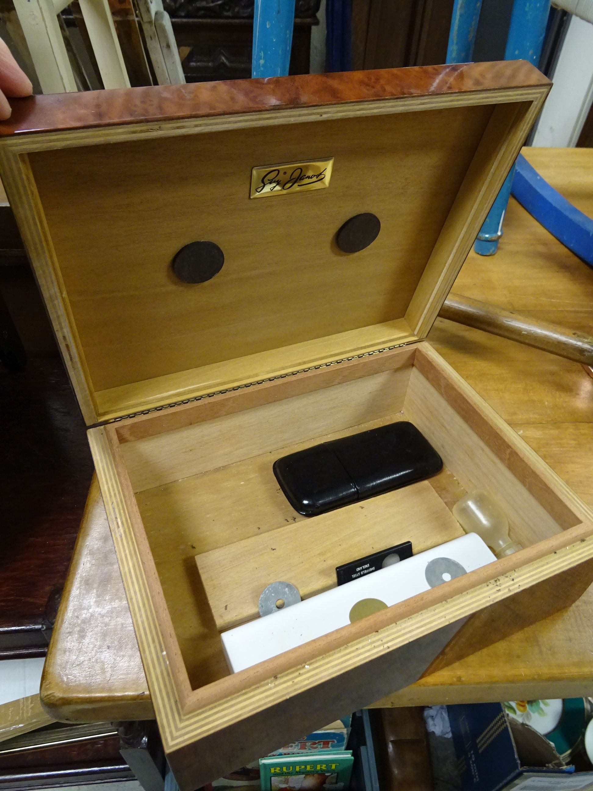 A Guy Janot humidor, with various accessories