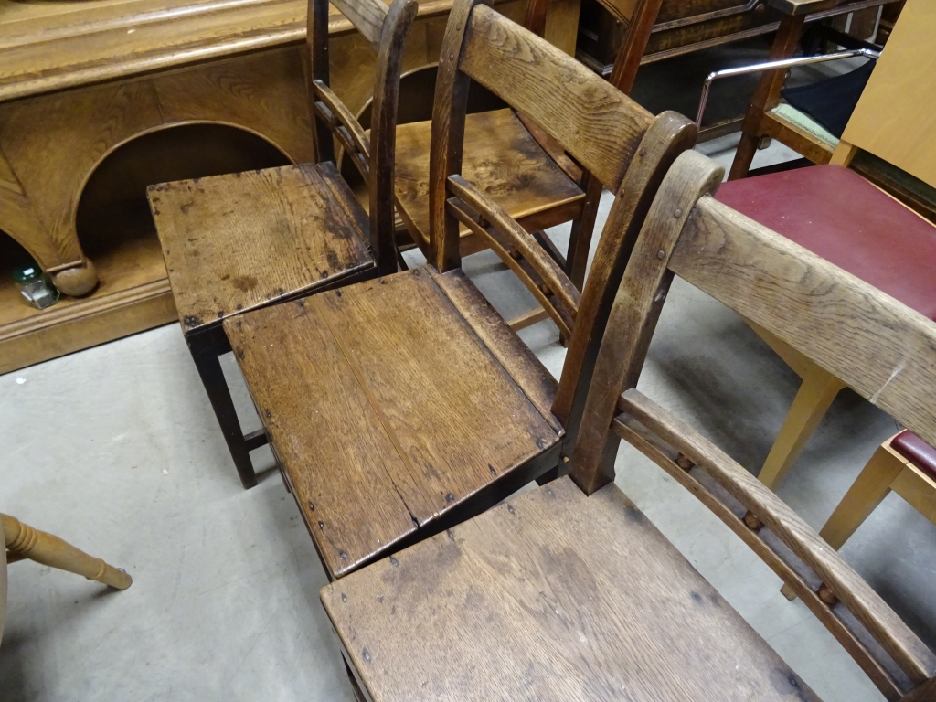 Three 19th Century oak kitchen chairs, along with four other 19th Century chairs