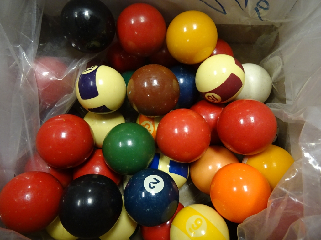 A collection of vintage snooker and pool balls