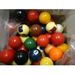 A collection of vintage snooker and pool balls