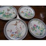 Four hand painted Chinese plates with red seal mark to the base