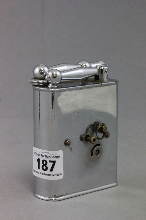 A novelty table lighter with integral clock