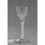 A 18th century wine glass, with white stem twist