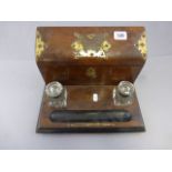 A Victorian walnut stationary box, with inkwell and glass inserts