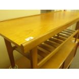 G-plan style teak coffee table 4' long x 14" deep ladder style shelving area below the top