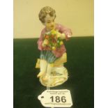19th early 20 th Century Meissen, Seated Boy 4.5" tall wearing mauve jackets