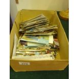 Box containing a large amount of old postcards,