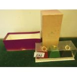 Asprey of London a 3 item paper weight set in original box, paper weights leather bound and