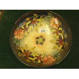 Moorcroft, a contemporary William Moorcroft bowl decorated with leaves and flowers 10" dia 3" tall