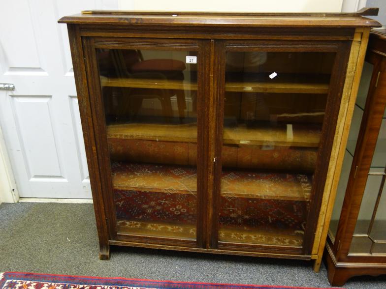 Oak glazed cabinet with 2 glazed doors to the front with shelving enclosed, 4' tall x 4' wide