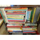 2 x shelves containing Children's Annuals and books including Beano, all books in a read condition