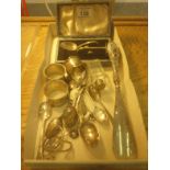 Tray containing silver items including 2 x napkin rings, odd silver spoons, and a silver babies