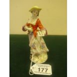 19th early 20 th Century Meissen, figurine of a Lady holding a sheet of music, 5" tall