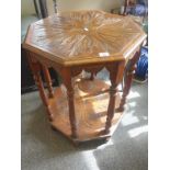 Victorian hexagonal topped table with carved decoration a two tier design with 8 supports