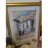 Framed and glazed watercolour of a French street scene with figures signed L Loquot? Dated 1928