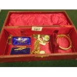 Leather bound jewellery box with contents including gilt metal and gold coloured items,