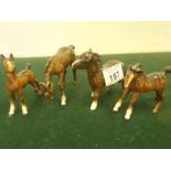 4 x Beswick Foals, in various stances, each one 3.5" tall