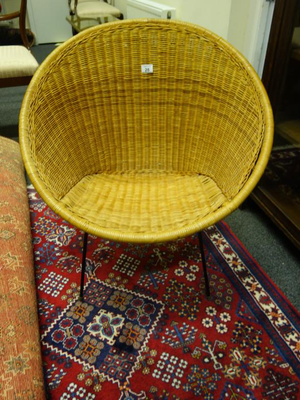 1960's design wicker chair on metal support