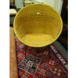 1960's design wicker chair on metal support
