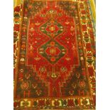 Good quality Persian style rug, antique style 6' long x 4' wide, burgundy and blue,