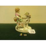 19th Century Meissen, a Goat and Girl group, 4.3/4" tall x 4.3/4" long marked with blue crossed