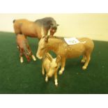 Beswick Donkey and Foal, fawn coloured and a similar period matt glazed Beswick Horse and Foal,
