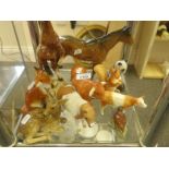 Shelf containing various china animals including 2 damaged Beswick Horses, a Russian Panda, 10