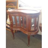 Antique style dumb waiter table, show cabinet below a tray area in the antique style, mahogany