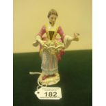 19th early 20 th Century Meissen, The Flower Seller 5.3/4" tall with blue crossed swords