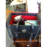 Photographic equipment inclduing a leather case with contents including Paterson Tank system,