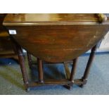 1920's oval oak gate leg table a 1900's towel rail both in need of restoration