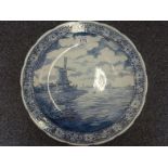 Delft charger, blue and white decorated with a Windmill, 16" dia marked to base Delfts by Boch