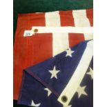 Full size American Flag 34" wide 5' long has one small tear,