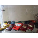 Shelf containing 15 Dinky Die Cast Toys