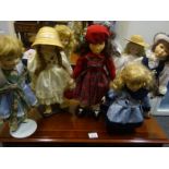 Plastic box and lid with enclosed amount of porcelain headed Dolls, various sizes from 6" to 14" 8