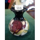 Squat Moorcroft Contemporary vase, 5.5" tall tube lined decoration of stylized flowers, impressed AV