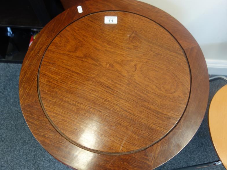 Mahogany antique style drum table with a selection of drawers