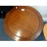 Mahogany antique style drum table with a selection of drawers