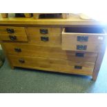 Good quality solid pine Arts & Crafts design side unit with a cluster of 3 short drawers above 2