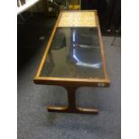 G-Plan, a teak coffee table, 4' long x 18" high with original G-Plan label, smoked glass top with