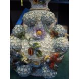 Large centre piece vase with applied decoration of flowers, birds twigs ect, blue crossed swords