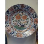 Interesting hand painted Fiancé ware charger decorated with flowers and stylized Birds, makers