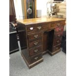 Queen Anne walnut design pedestal desk with inlaid to top, with planked back, a cluster of 4 short