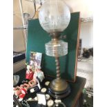 Superb Victorian glass and brass oil lamp 27" tall on a black base with a barley twist brass