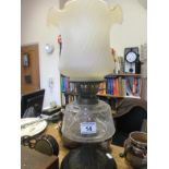 Superb Victorian period oil lamp with shade on black marble style base with brass centre section