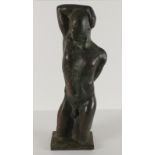 A bronzed composite figure of a naked man, 20" high (50.8cm)
