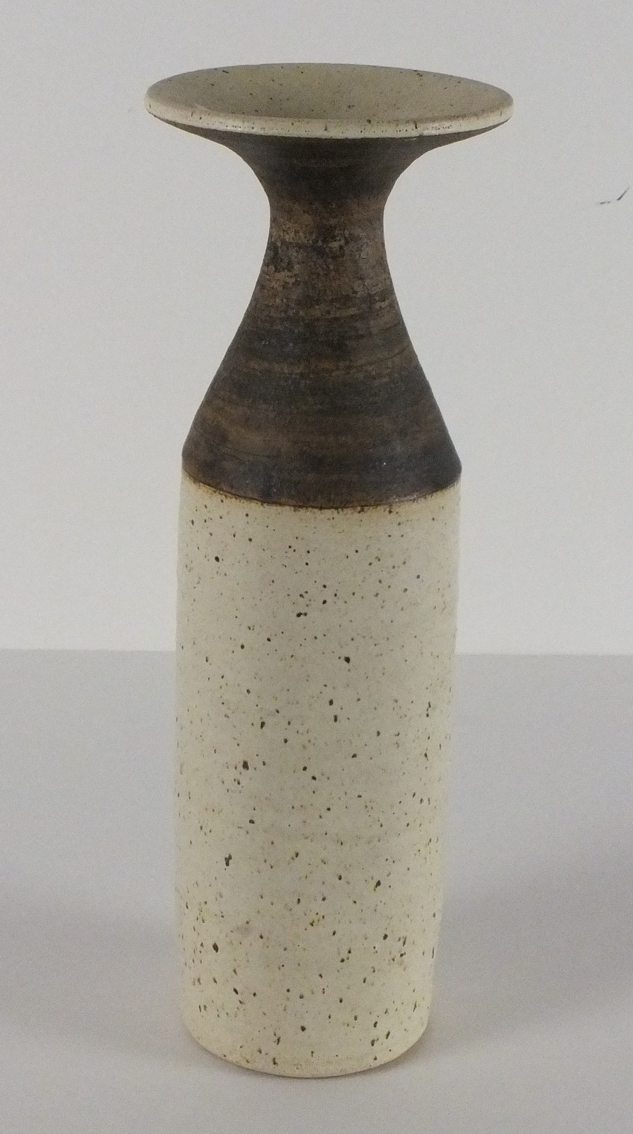 Dennis LANE, A cylindrical stoneware vase with trumpet form neck, Circa 1957-1969), Impressed