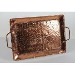 John PEARSON (1859-1930), A Newlyn Copper Tray with hammered finish & twin handles with raised &